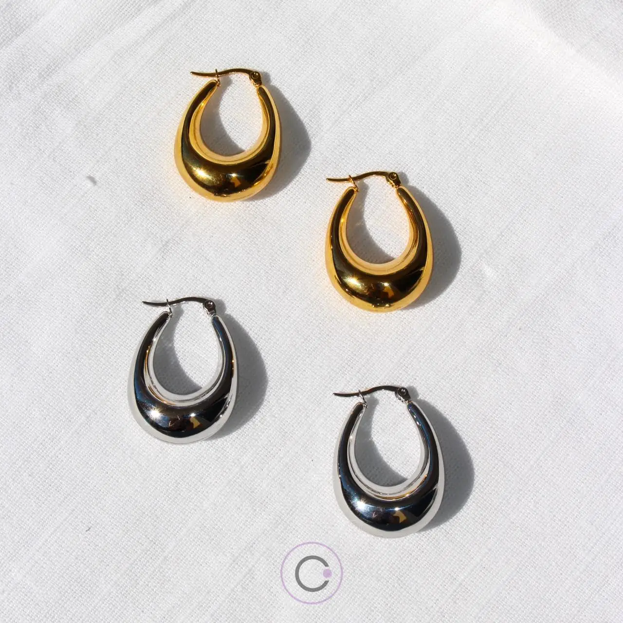 brincos elegantes aço