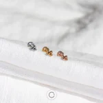 piercings em aço minimalistas